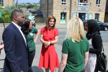 Jo Cox speaking to a group of people in Batley